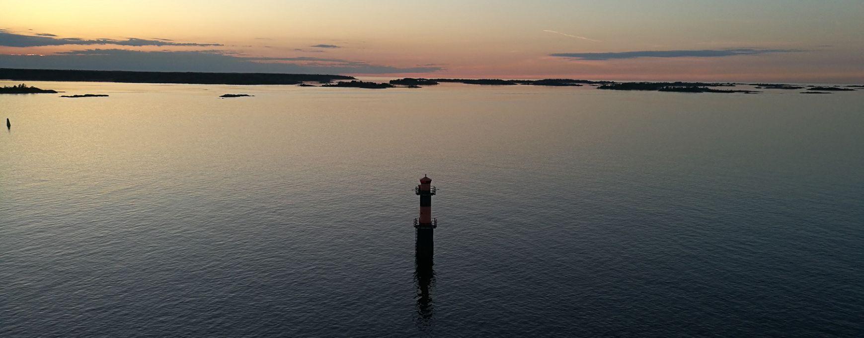 A lone lighthouse in the Baltic Sea, surrounded by Naantali's neighbouring islands.
